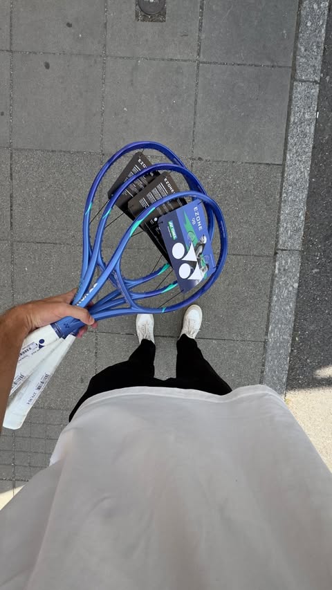 Instagram post by @tennistomy for Yonex. Caption reads: Poor Michael, lucky Tomy…🙂‍↔️🎾🤟🏻 ad.