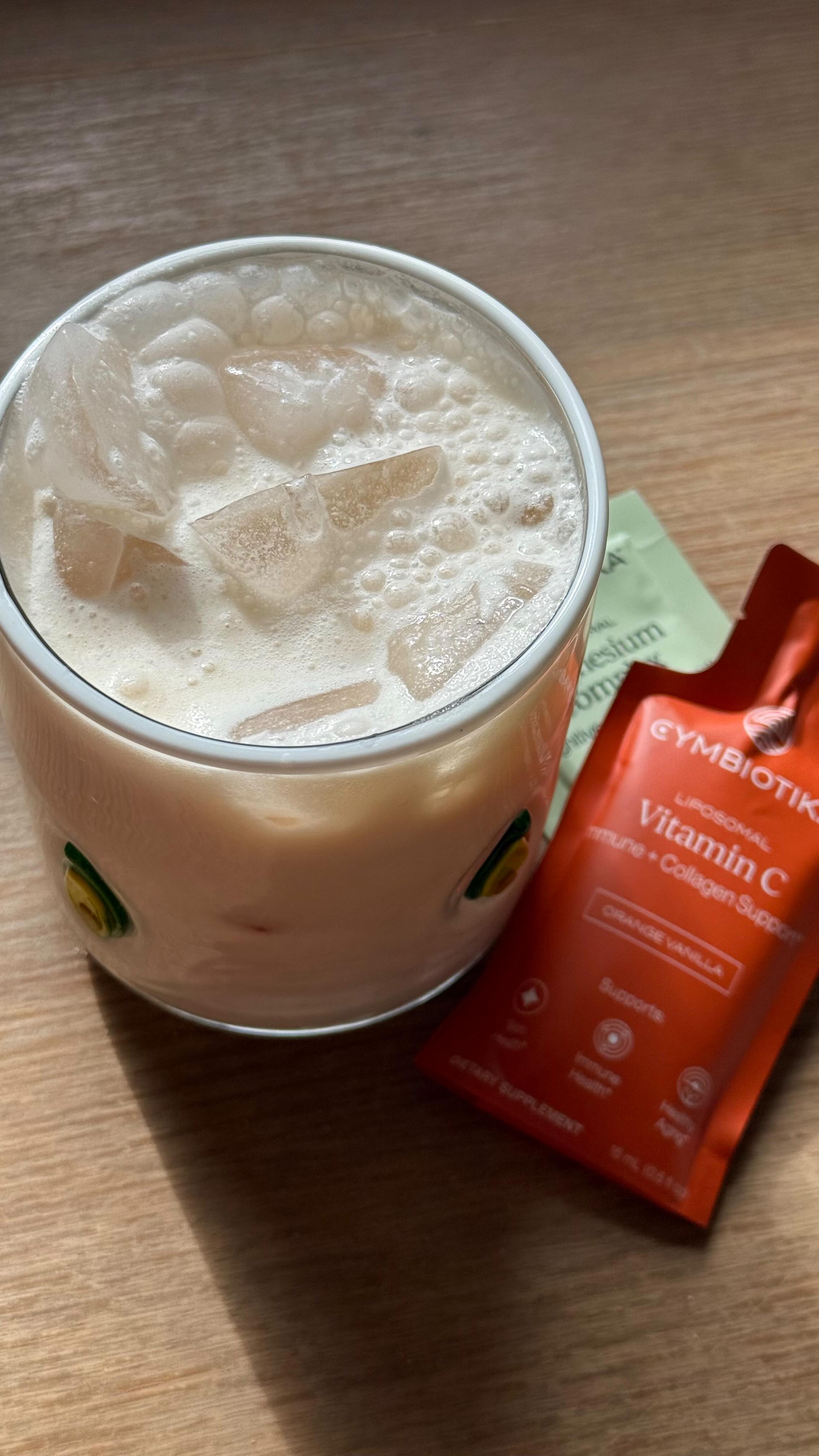 Instagram post by @glowwithella for Cymbiotika. Caption reads: [...] function, stress and radiant skin.....