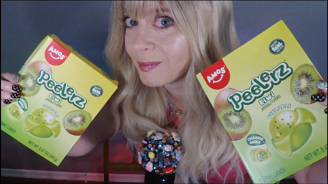 YouTube post by @MyASMRAddiction for Amos Sweets. Caption reads: You can find Kiwi Peelerz and other Amos Candy at....