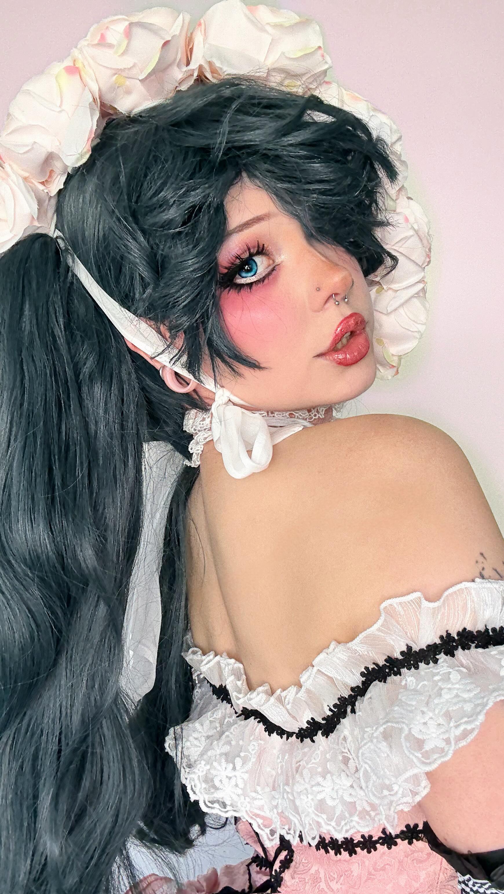 Instagram post by @kirapika.cos for dokidokicosplay. Caption reads: [...] ciel’s voice 🤨

Costume & wig from....