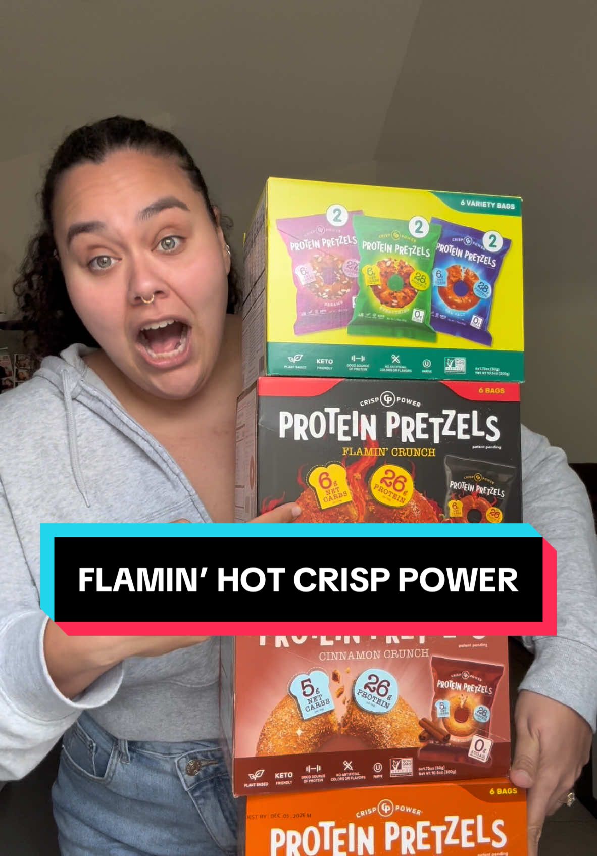 TikTok post by @lizaslosingweight_ for Crisp Power. Caption reads: @Crisp Power has #flaminhot #protein pretzels ?!?!....