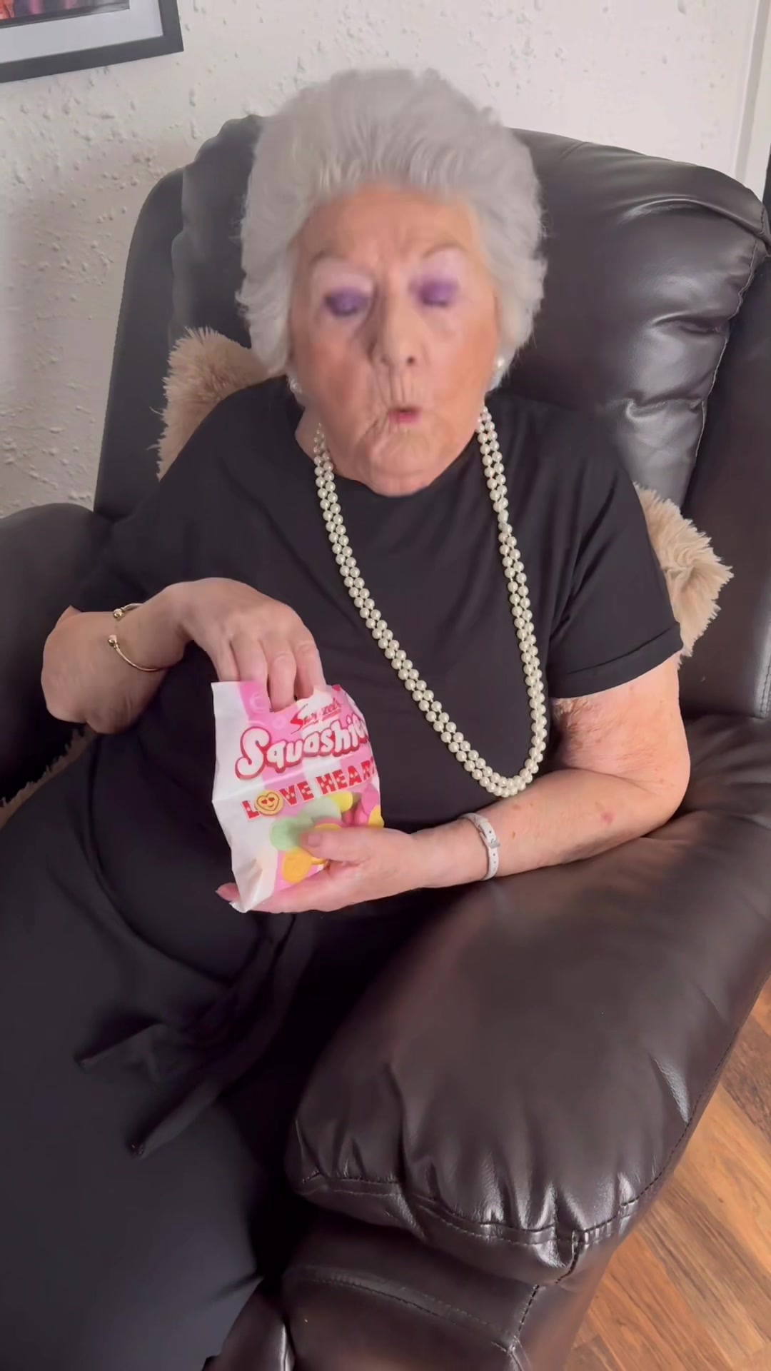 TikTok post by @grimegran for Swizzels. Caption reads: AD Spread the love with squashies love hearts....