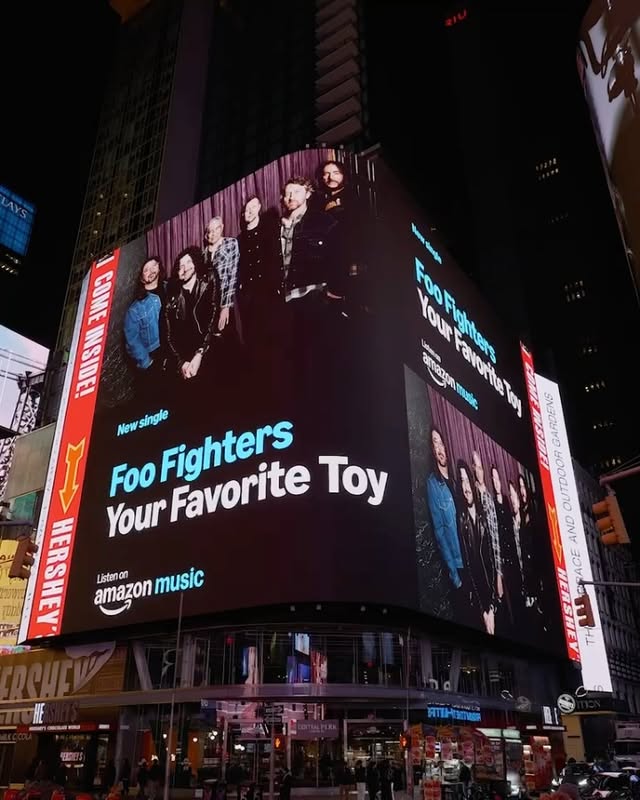Instagram post by @foofighters for Amazon Music. Caption reads: [...] in Times Square and leading off....