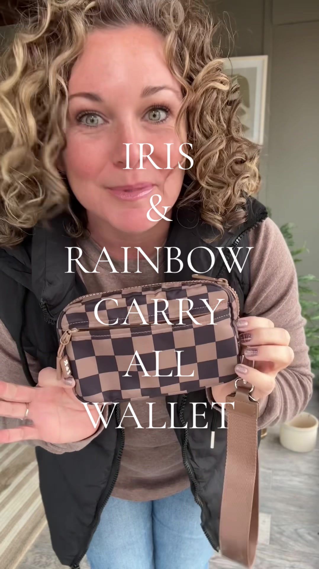TikTok post by @itschristydru for Iris And Rainbow. Caption reads: Best little wallet that holds so much! @Rainbow....