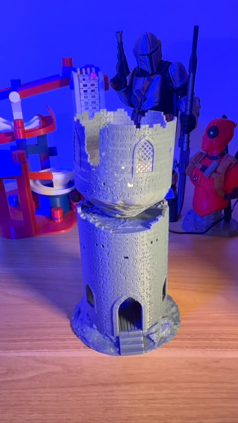 Instagram post by @nik00lo for Bambu Lab. Caption reads: A levitating island with a castle, brought to life....