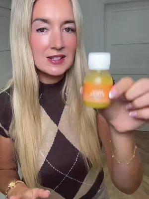 TikTok post by @itsmolliesworld for Nutriseed. Caption reads: ginger and tumeric shots from @nutriseed #ginger....