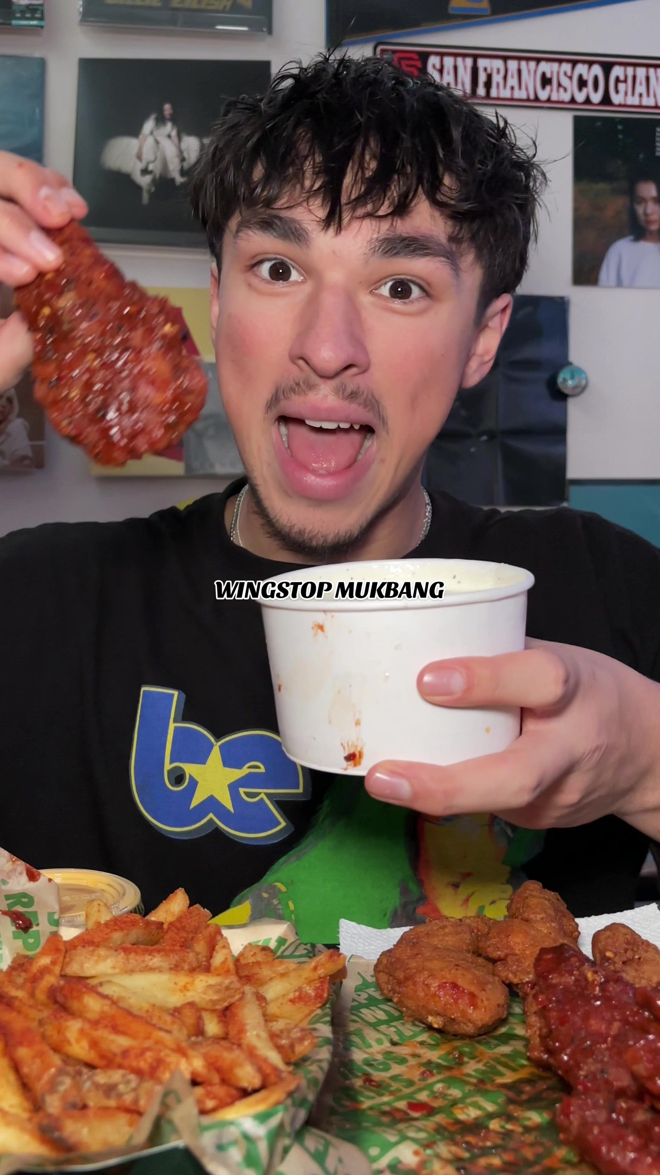 TikTok post by @thefoodiesergio for Wingstop. Caption reads: trying wingstop flavors i’ve never had before 🤨....