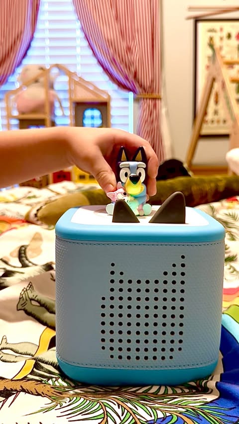 Instagram post by @happilyeverabshire for Target. Caption reads: #TargetPartner Bluey + Tonies = a pretty pawfect....