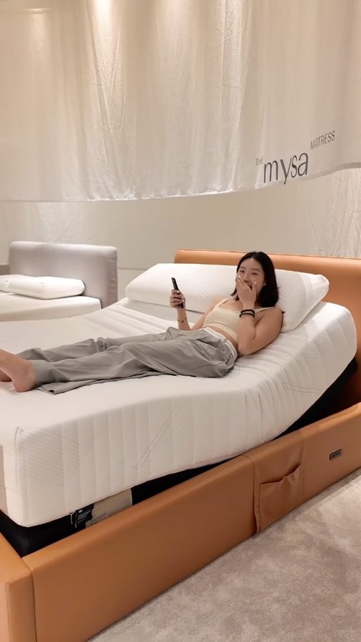 Instagram post by @kelkeltan for Woosa Sleep. Caption reads: Sleep till you drop? 💤 That’s literally me on....