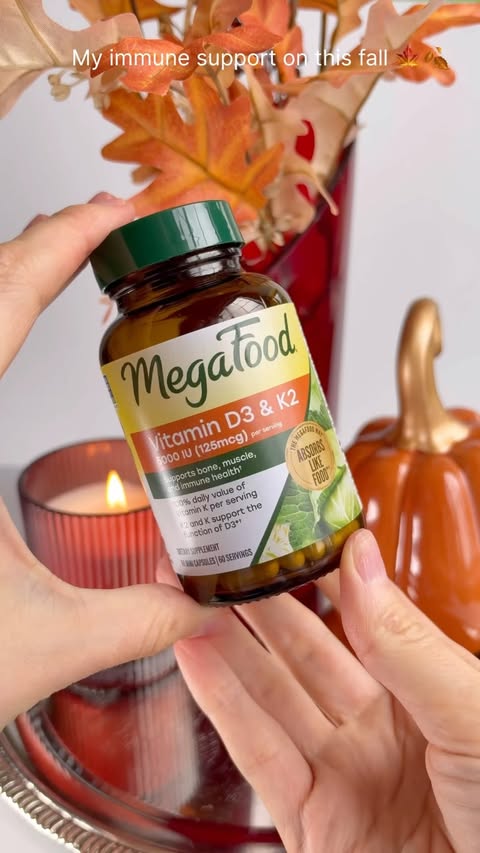 Instagram post by @by_alenchik for MegaFood. Caption reads: #ad 🍁🍂 My immune support on this fall @megafood....