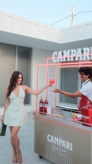 Instagram post by @the_zlist for Campari. Caption reads: #ad21+ @campariofficial Campari Spritz Square is....