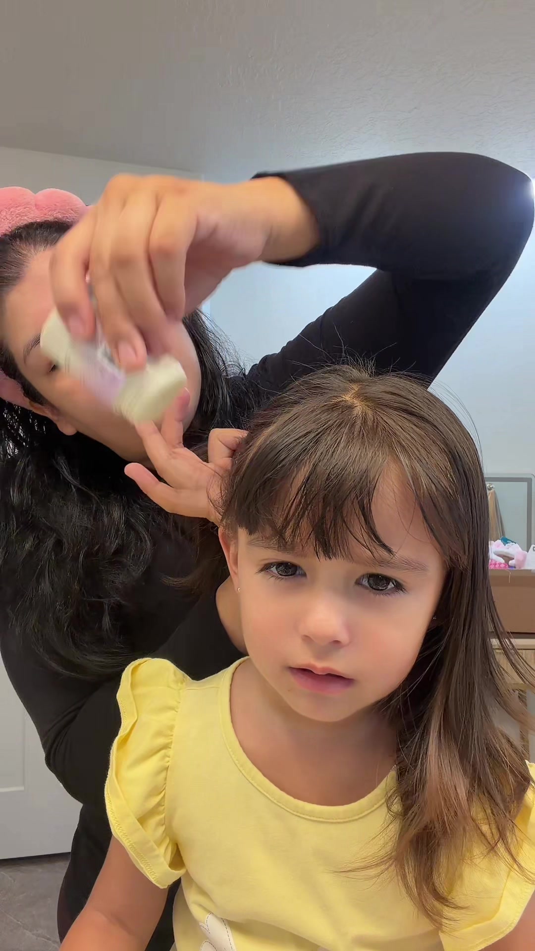 TikTok post by @amesele for Insert Name Here. Caption reads: Doing my girls’ hair is either a sweet bonding....