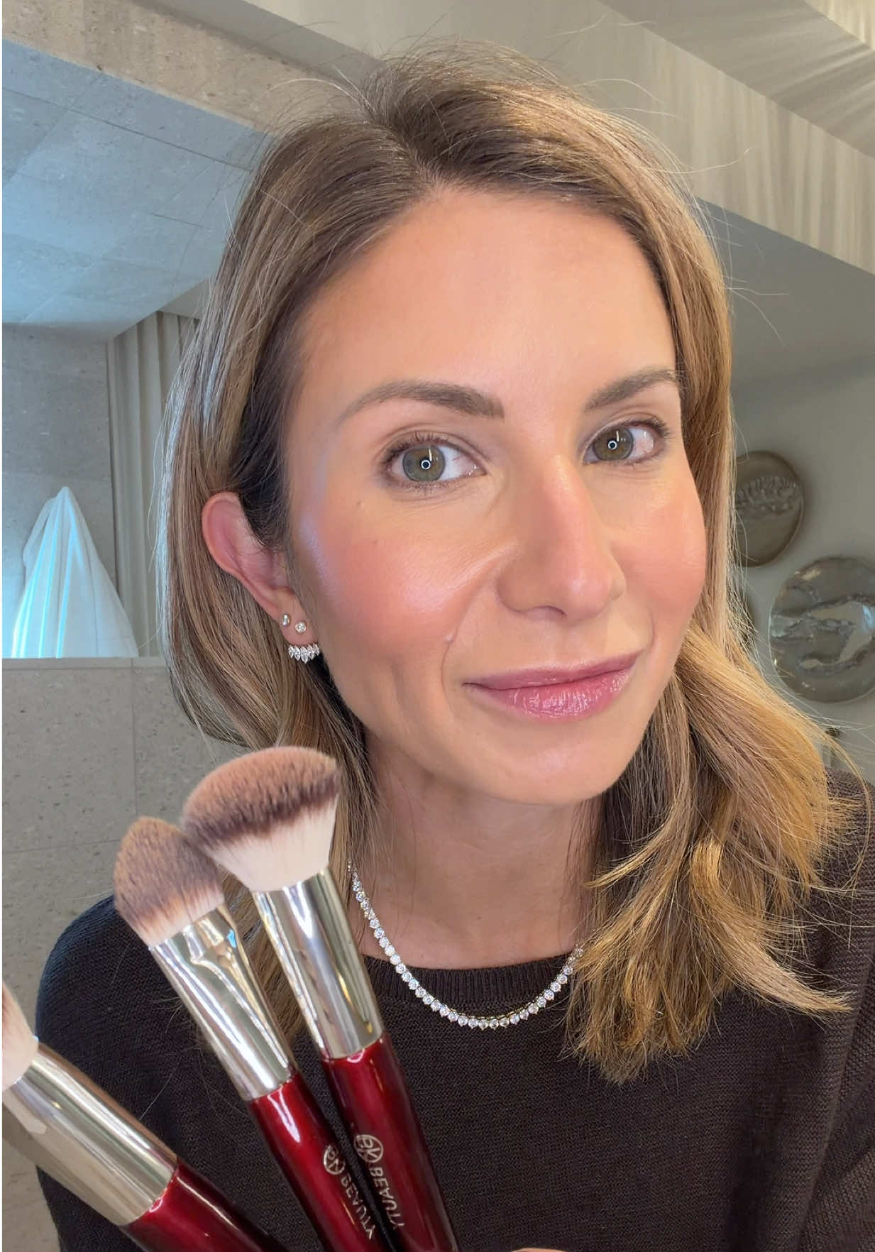 TikTok post by @lisajmakeup for BK Beauty. Caption reads: The @BK Beauty Brushes Core Complexion Trio makes....