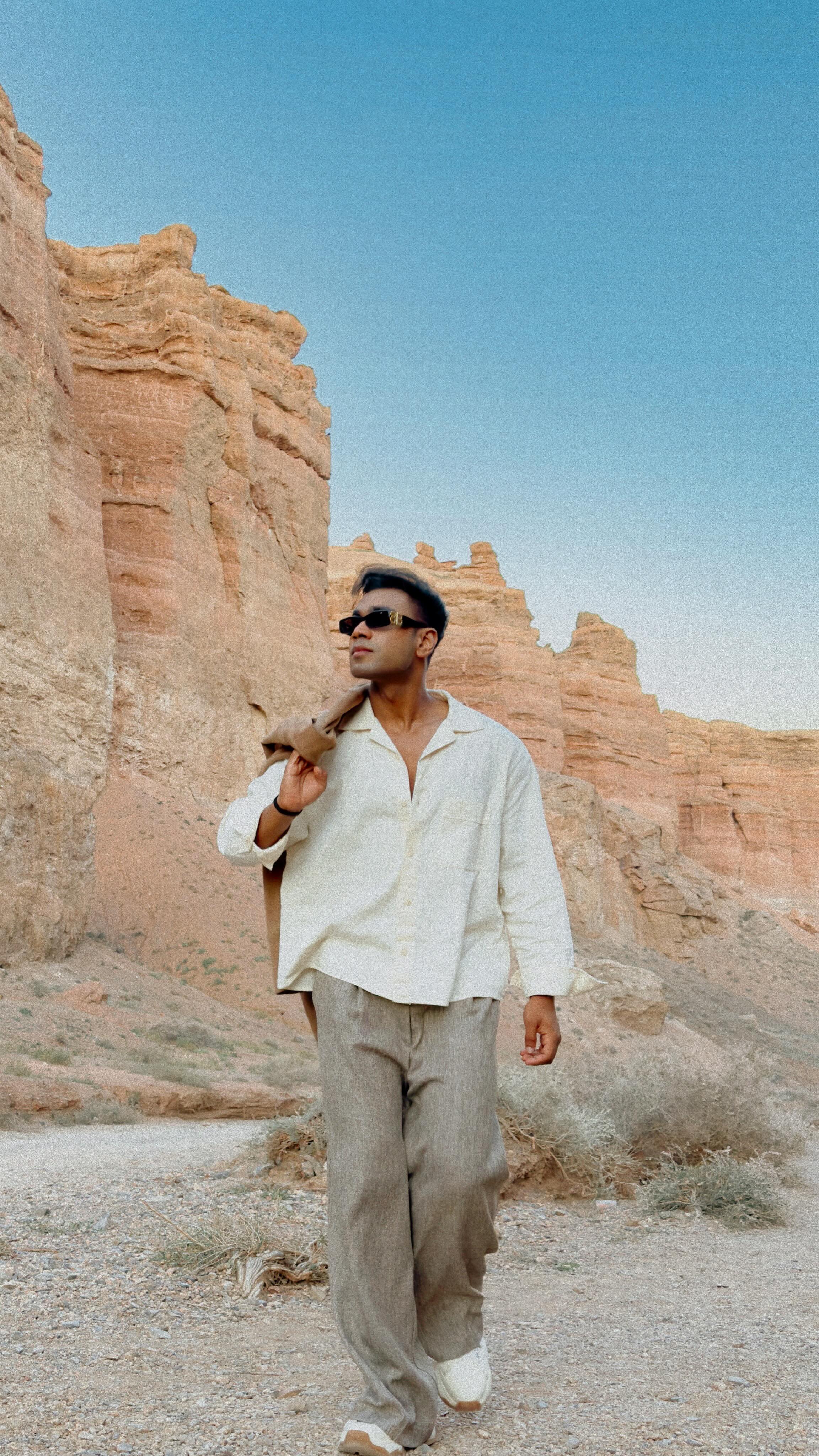 Instagram post by @theorangeepistles for MakeMyTrip. Caption reads: [...] I just booked a trip! ✈️ And with....