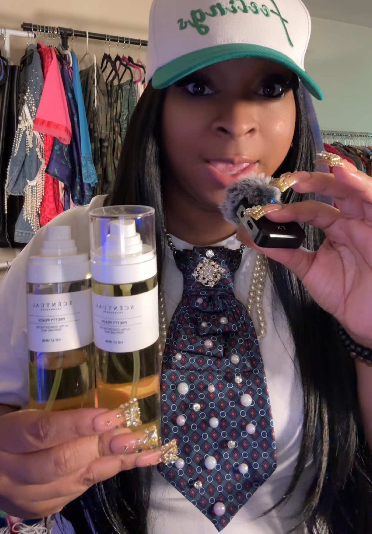 TikTok post by an influencer for Scentual Fragrances. Caption reads: @Scentual Fragrances #fyp #explorepage.
