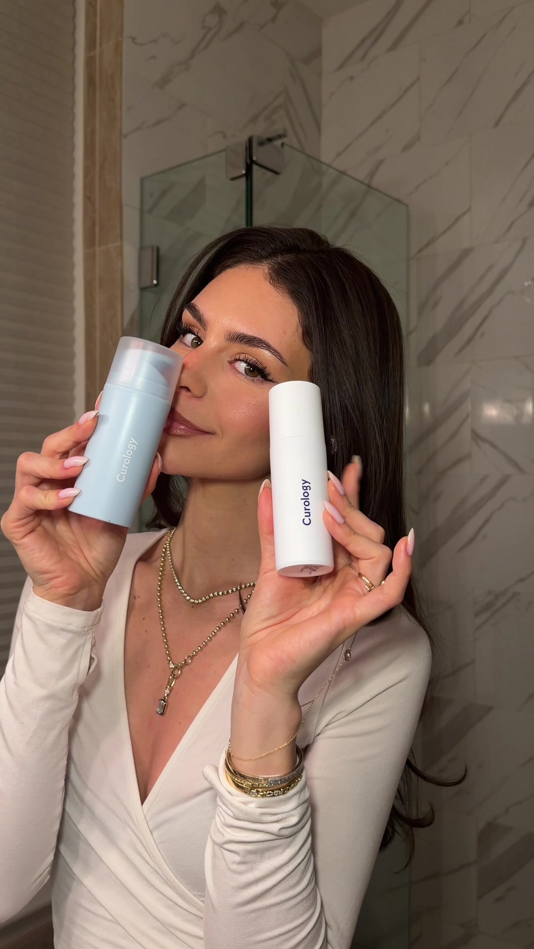 TikTok post by @kirakirbyy for Curology. Caption reads: On my glass skin journey in 2026🤍....