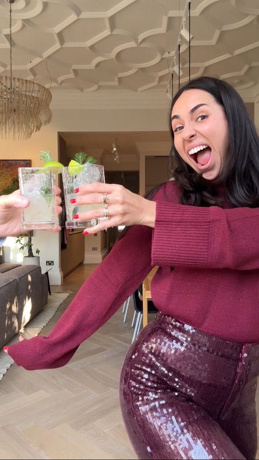 Instagram post by @ellieevelynsmith for Olmeca Altos Tequila. Caption reads: Spot my dad in the background 😂 Christmas timeee....