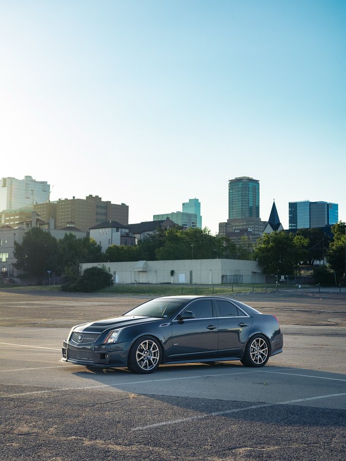 Instagram post by @not_a_malibu for MickeyThompsonTires. Caption reads: Pull up in my city on the M, we cut the block....