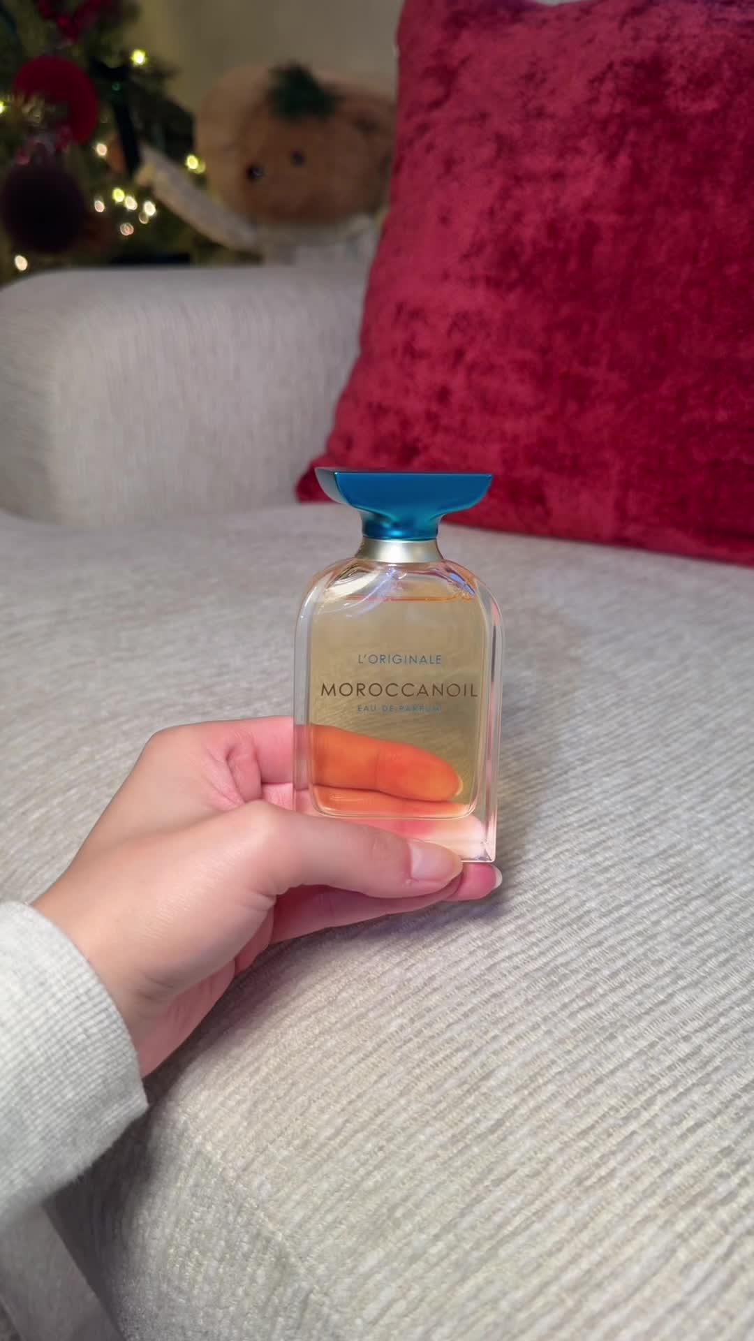 TikTok post by @psychictexas for Moroccanoil. Caption reads: The gorgeous @Moroccanoil perfume I have been....