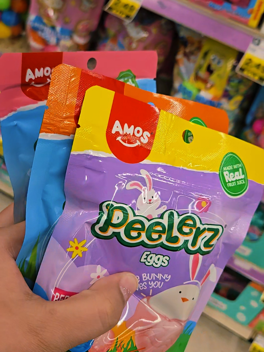 TikTok post by @koolmom223 for Amos Sweets. Caption reads: Easter Edition AMOS!! 🐰🌷🥚 @Amos Sweets #amos....