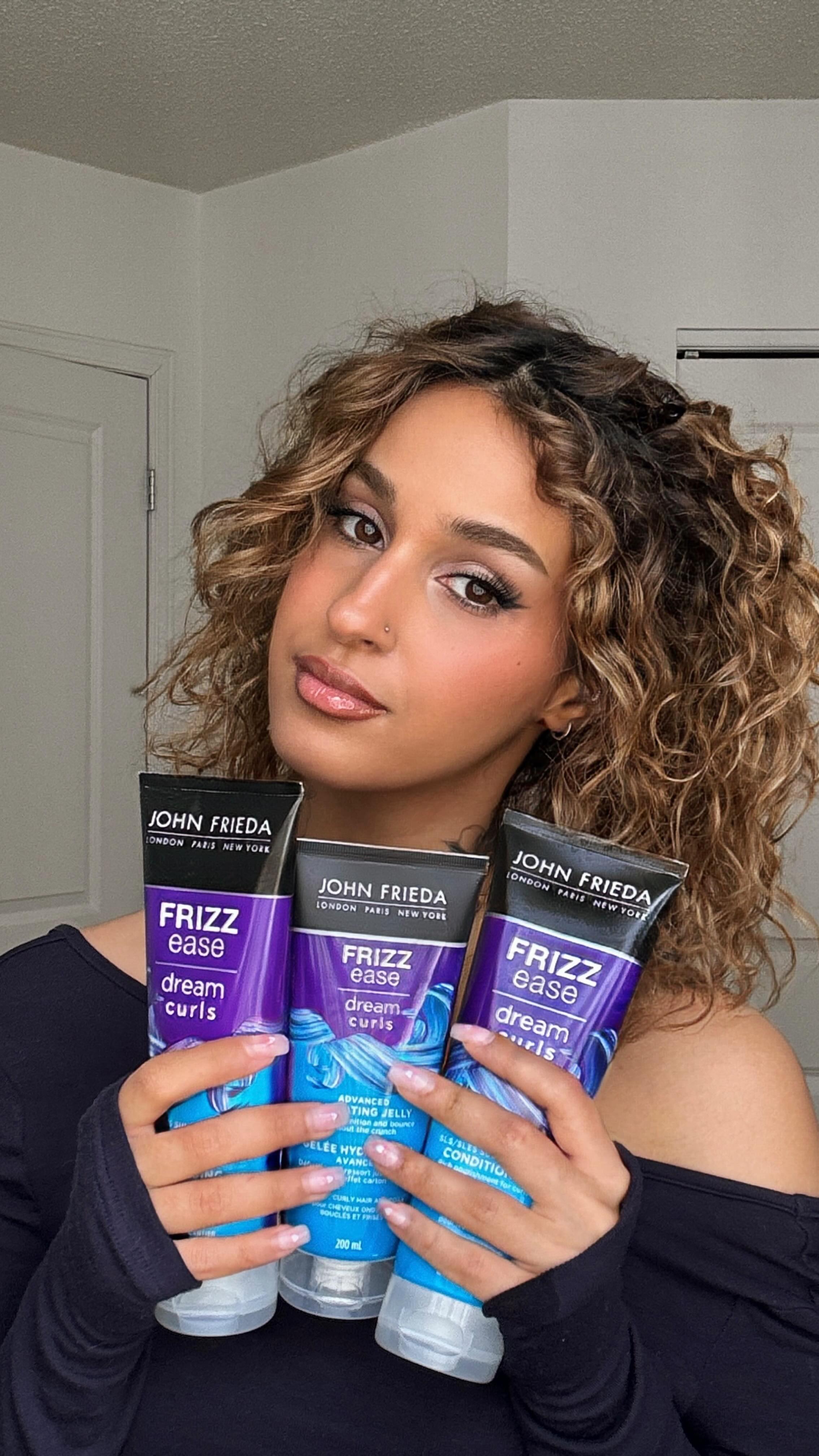 Instagram post by @mardemers_ for John Frieda. Caption reads: Curly hair can be unpredictable, but I’ve found....