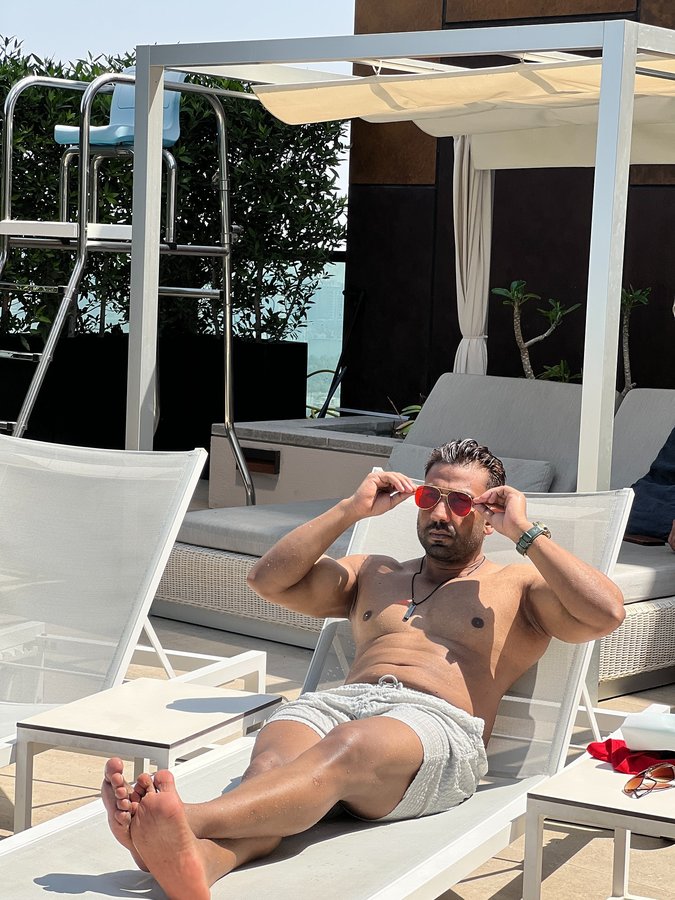 Instagram post by @mastercoach_hasmuddink for Hilton Hotels & Resorts. Caption reads: @hiltonhotels #dubai #rooftoppool ….