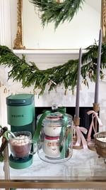 Instagram post by @joyfullygreen for Keurig. Caption reads: #ad 🎅☕️How to be the most popular guest! 🫡Bring....