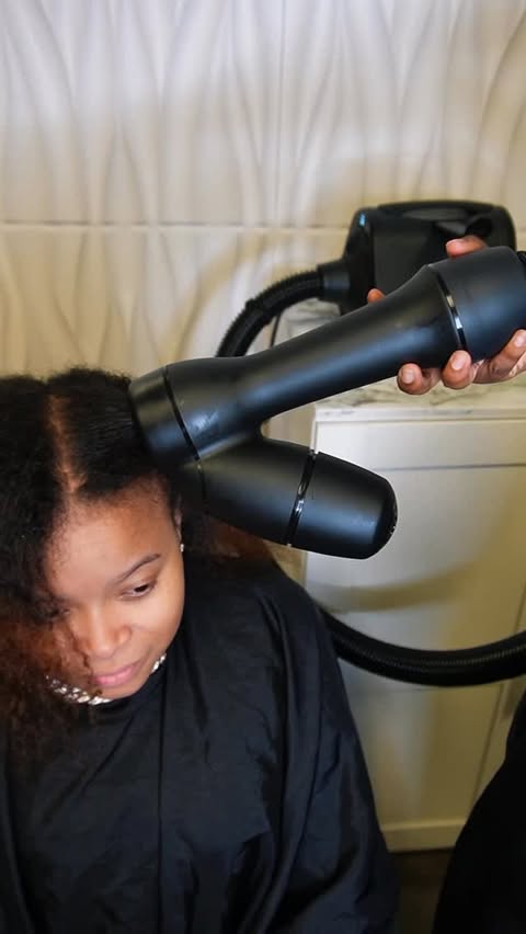 Instagram post by @maryandrea.davis for RevAir. Caption reads: I love my RevAir hair dryer… like I love it, love....