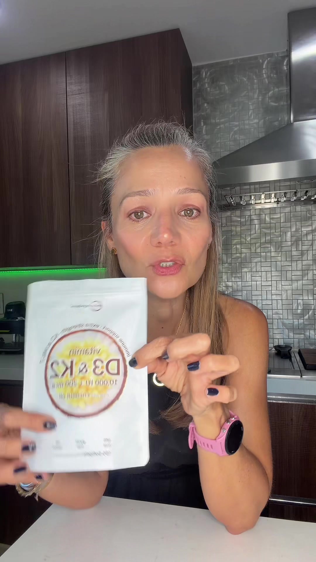 TikTok post by @abue.fit for Micro Ingredients. Caption reads: [...] D3&K2 para proteger tus huesos @Micro....