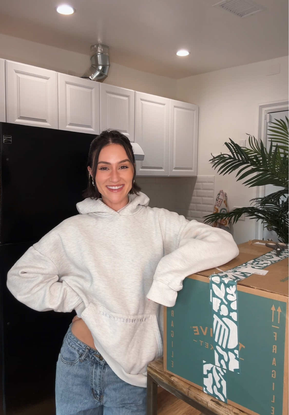 TikTok post by @paigeejenna for Thrive Market. Caption reads: Stocking Dylan's new music studio fridge 💛 ....