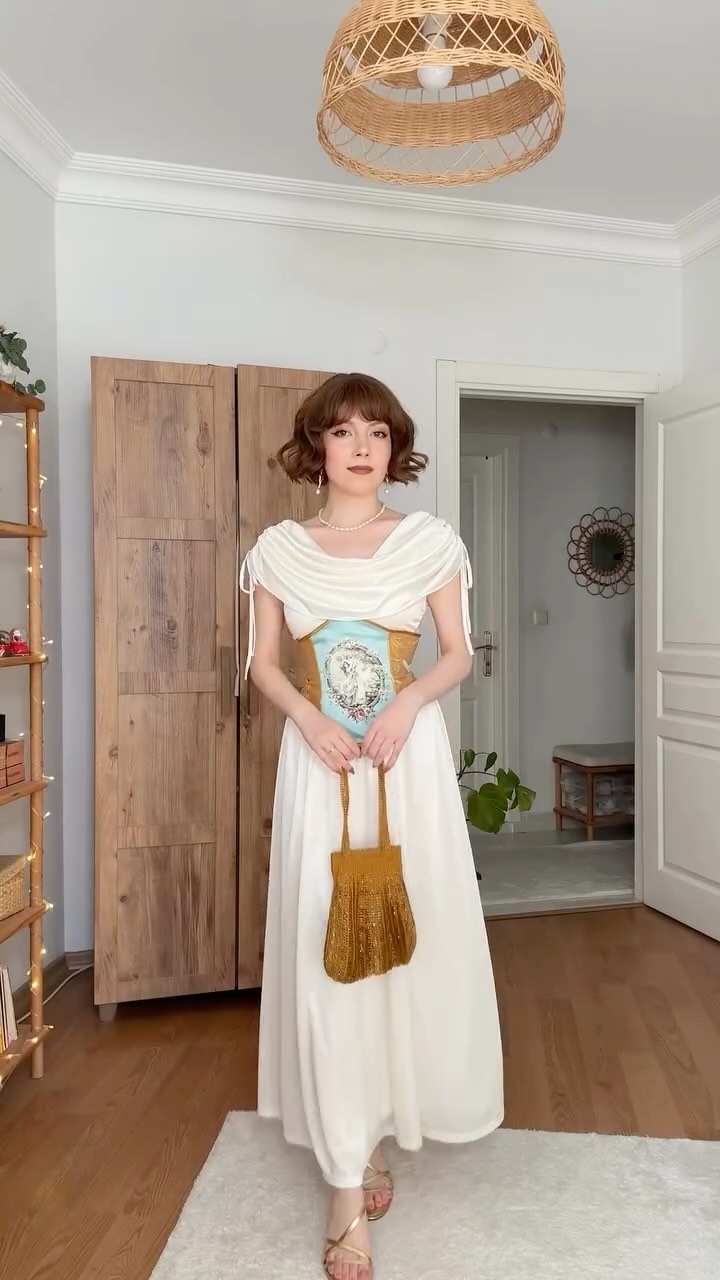 Instagram post by @gizemsvintagecloset for LaceMade. Caption reads: [...] 
.
the dress and corset: @lacemadeofficial....