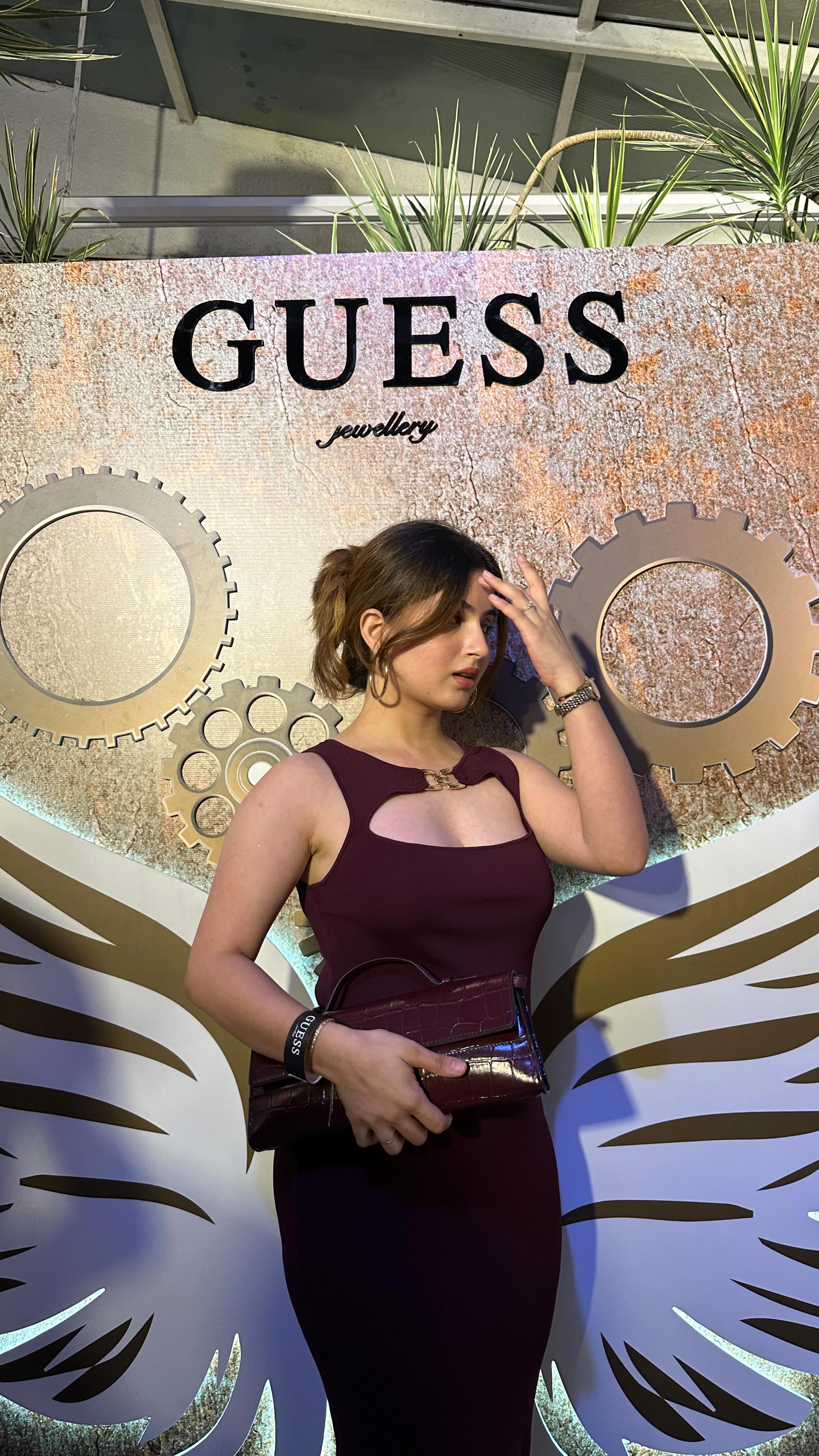 Instagram post by @vamakshimagotra for GUESS Watches. Caption reads: For @guess @guesswatches 💖
.
.
Dress, heels and....