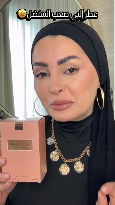 Instagram post by @rolaa.safar for ELIE SAAB. Caption reads: Elie Saab Le Parfum Absolu ✨✨
	
SHOP NOW @namshi....