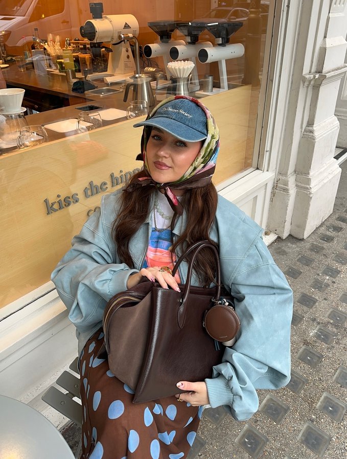 Instagram post by @gracelotti for Radley. Caption reads: blue & brown for autumn 🤎 ad* @radleylondon.