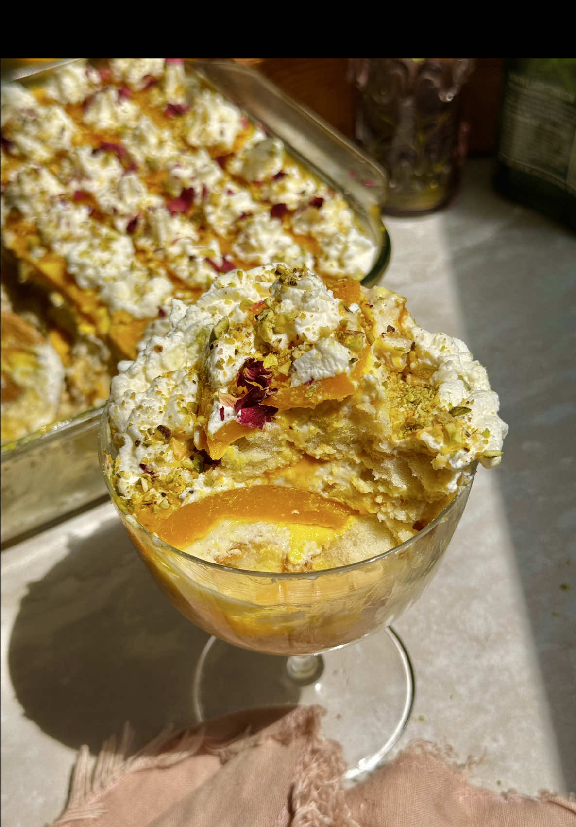 TikTok post by @lahbco for Philadelphia. Caption reads: #ad Tiramisu tastes even better with mango and a....