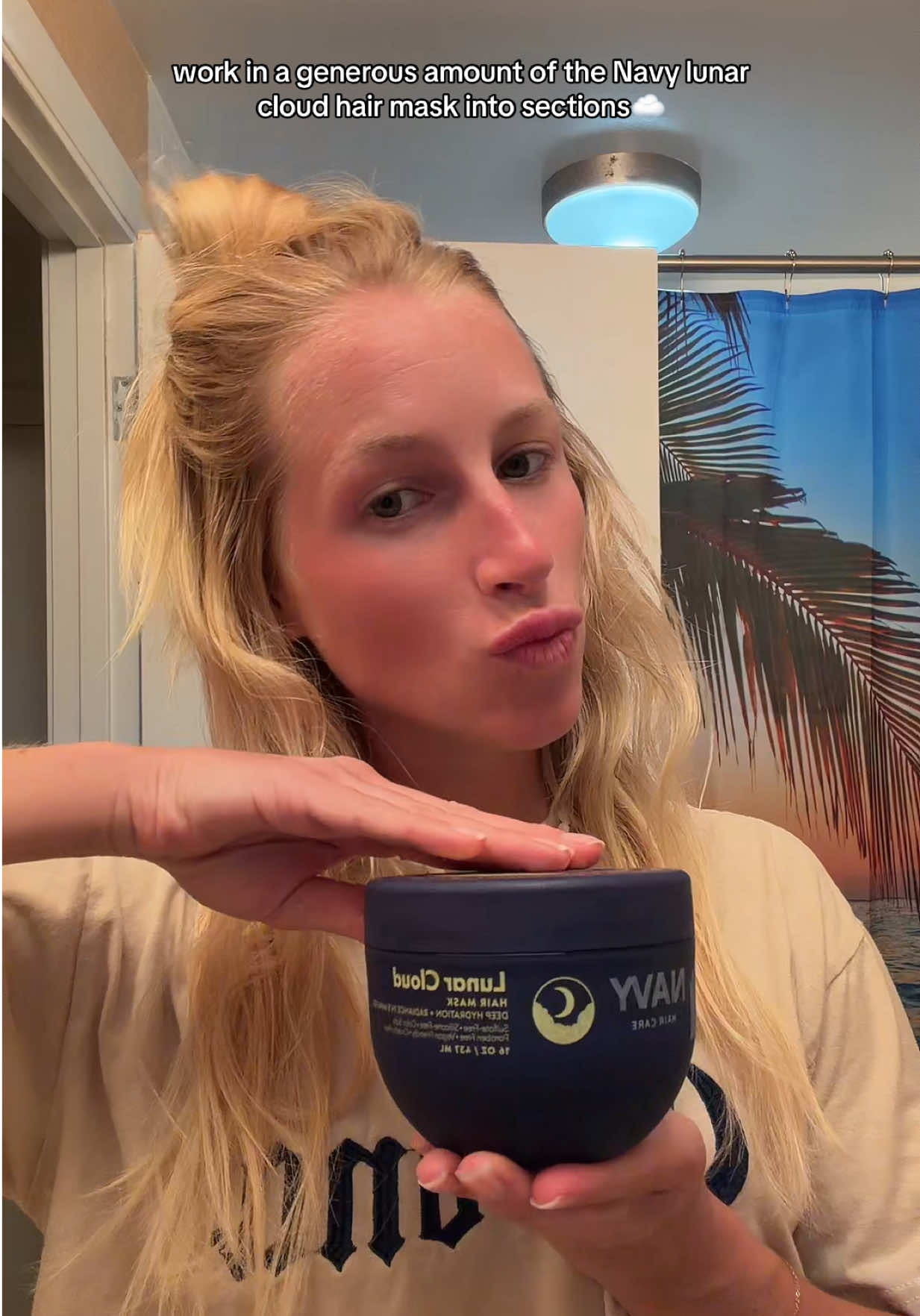 TikTok post by @halledorann for NAVY Hair Care. Caption reads: [...] hair care and I’m obsessed with this....