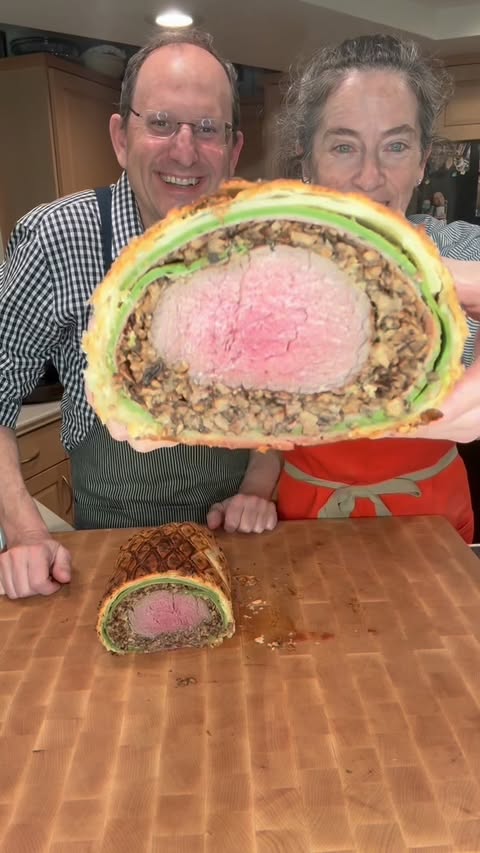 Instagram post by @seattlehanddoc for Caraway Home. Caption reads: BEEF WELLINGTON W/SPINACH CREPES
Despite many....