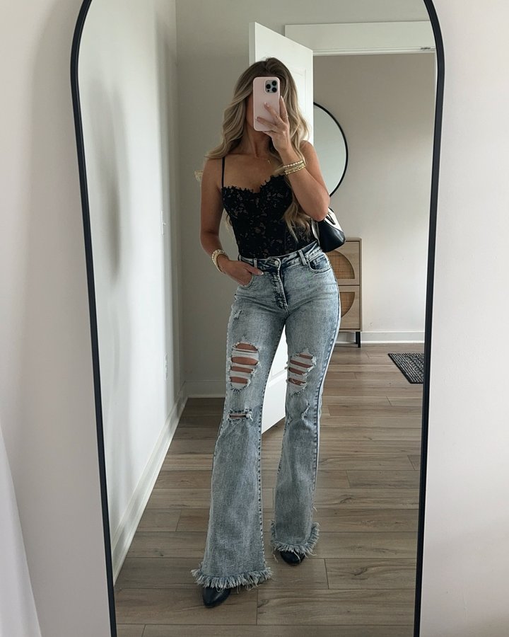 Instagram post by @erica_mmiller for Willow Boutique. Caption reads: The perfect outfit combo for a date night/concert....