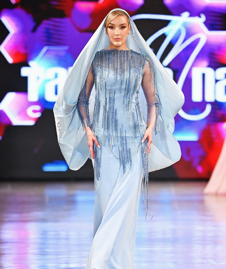 Instagram post by @tamaranasrofficial for Black Radiance Beauty. Caption reads: “Who Am I”:A shimmering rainfall of blue that....