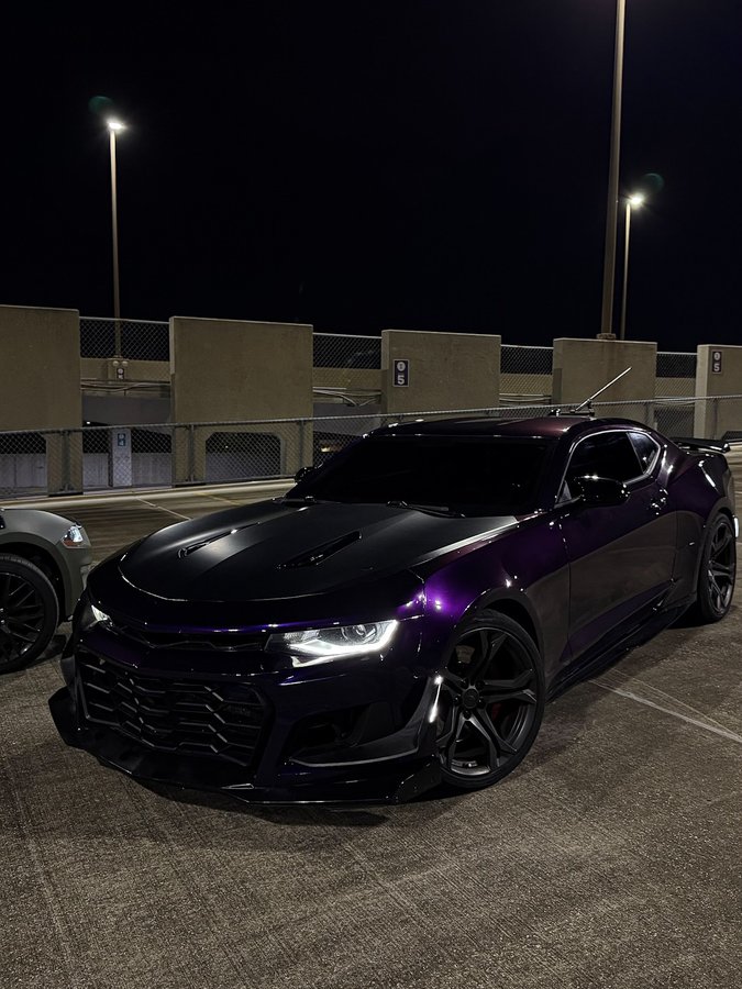 Instagram post by @1leheem for Kustom Interior. Caption reads: My turn 👾

Wrapped in Midnight Purple from....