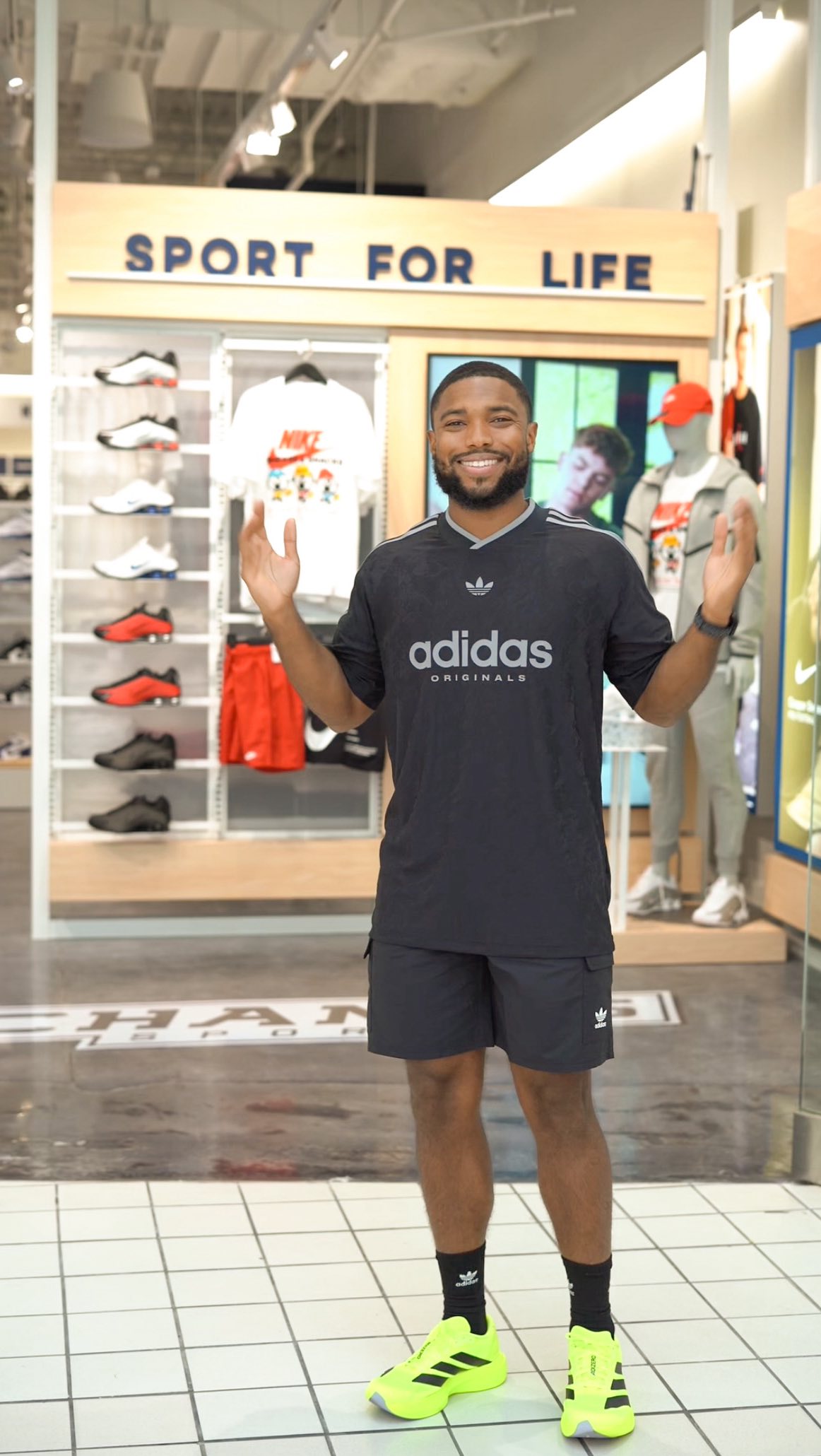 Instagram post by @iamspreadtheword for Champs Sports. Caption reads: #ad Come shop with me at the brand new Champs....