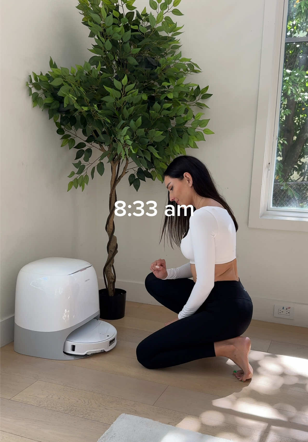 TikTok post by @annatwinsies for Roborock. Caption reads: ASMR MOM MORNING ROUTINE ☀️☕️🐾🧹🍂🛒✨ Elevate....
