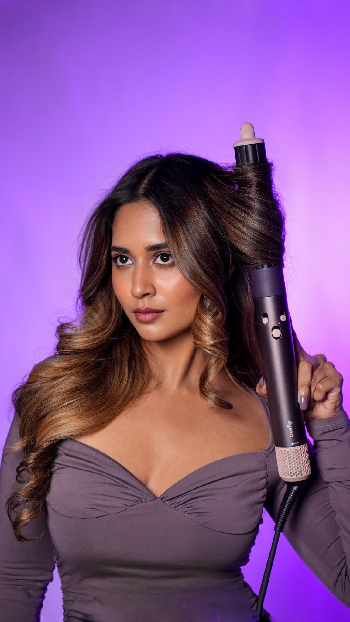 Instagram post by @bandedinacandid for Dyson. Caption reads: #collaboration
Wrapped in shades of Jasper Plum💜....