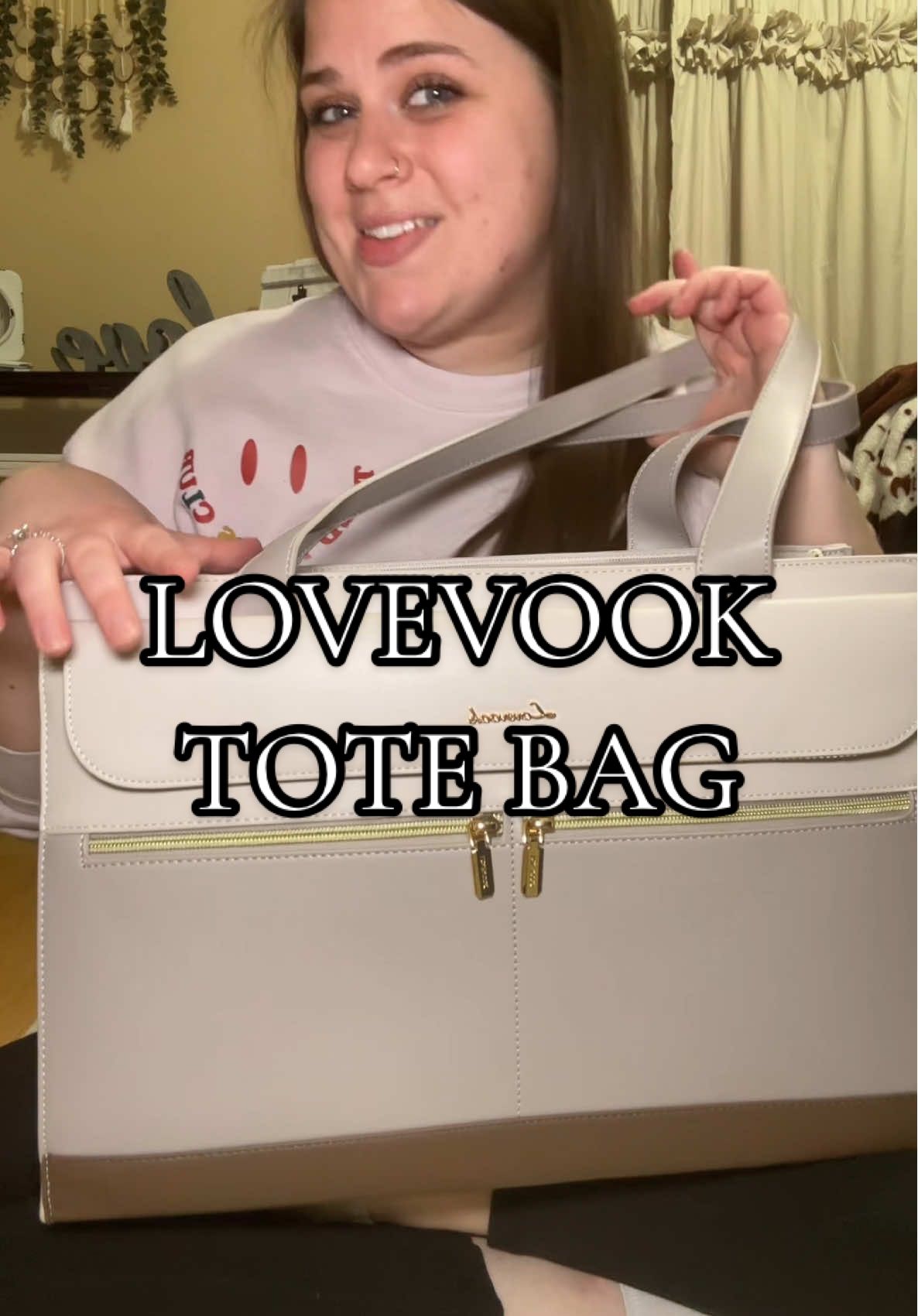TikTok post by @akerspartyof6 for Lovevook. Caption reads: This work bag has it all @Lovevook Bags....