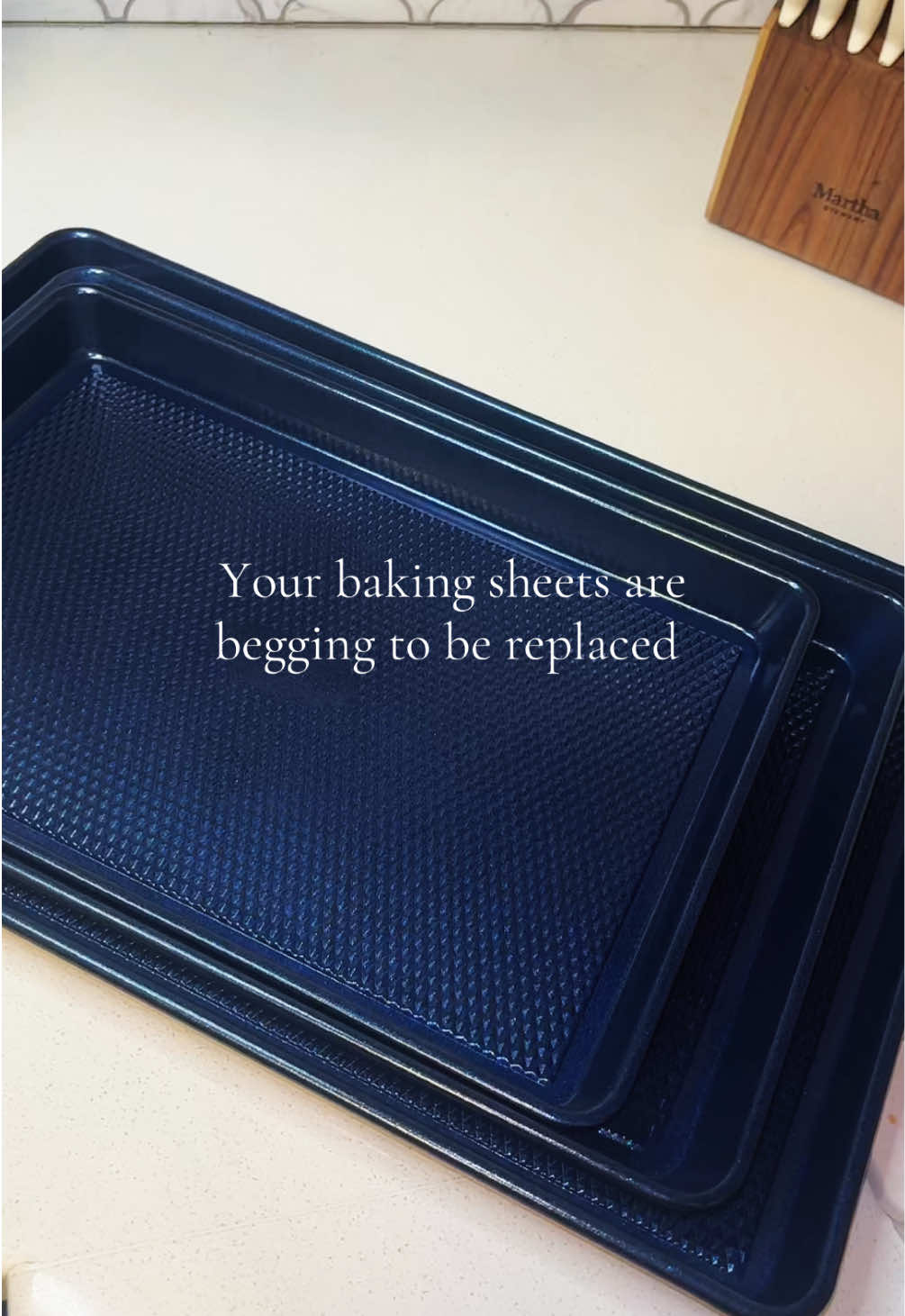 TikTok post by @tessajordannance for Kit Experto. Caption reads: Still using those old baking sheets? #baking....