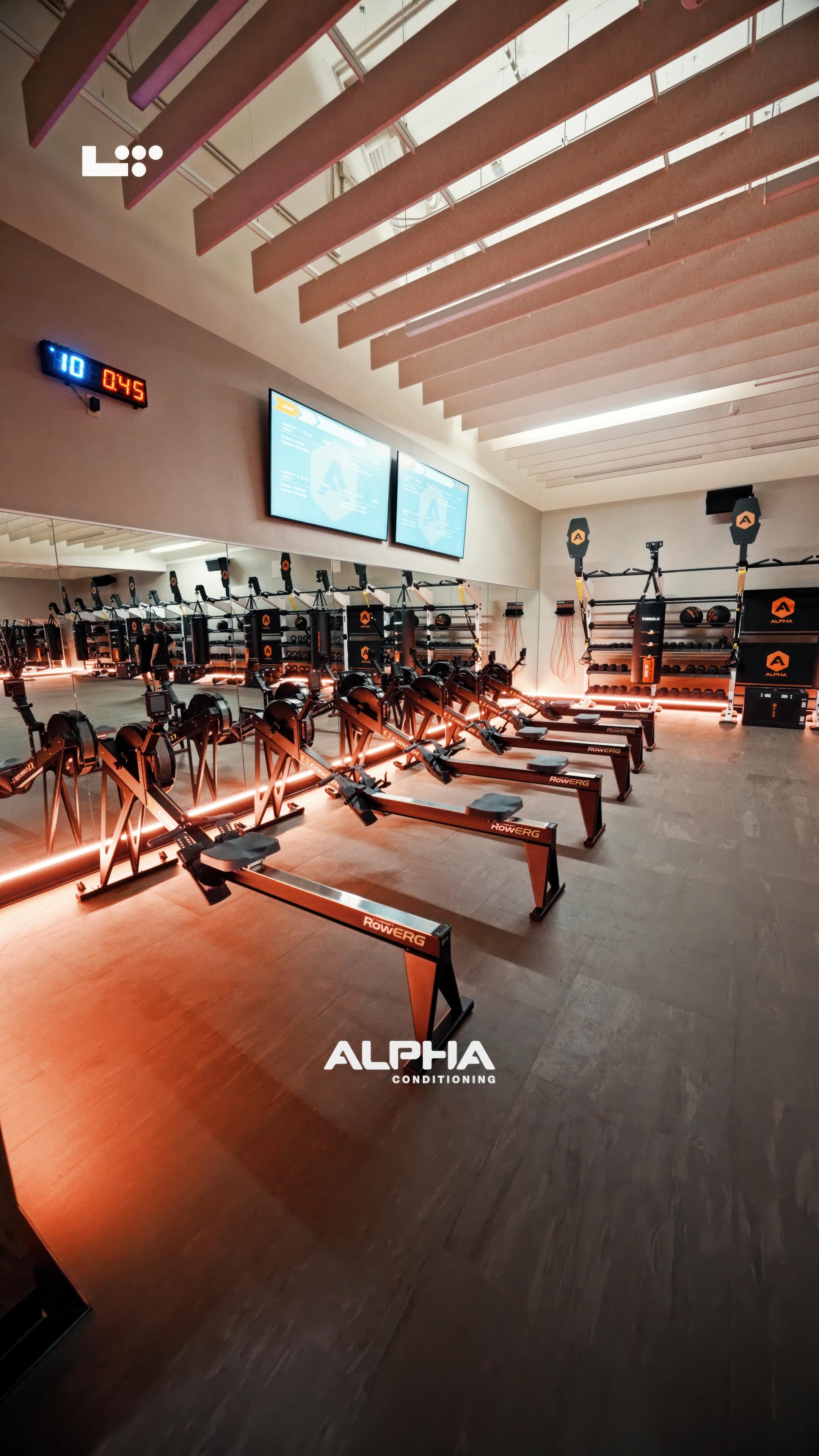 Instagram post by @bodybyjuancho for Life Time. Caption reads: ALPHA CON — A full-body athletic training session....