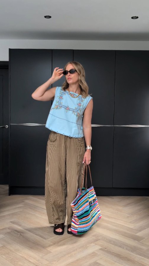 Instagram post by @styledby_mrsj for Free People. Caption reads: The trousers you all went wild for in my DMs, I....