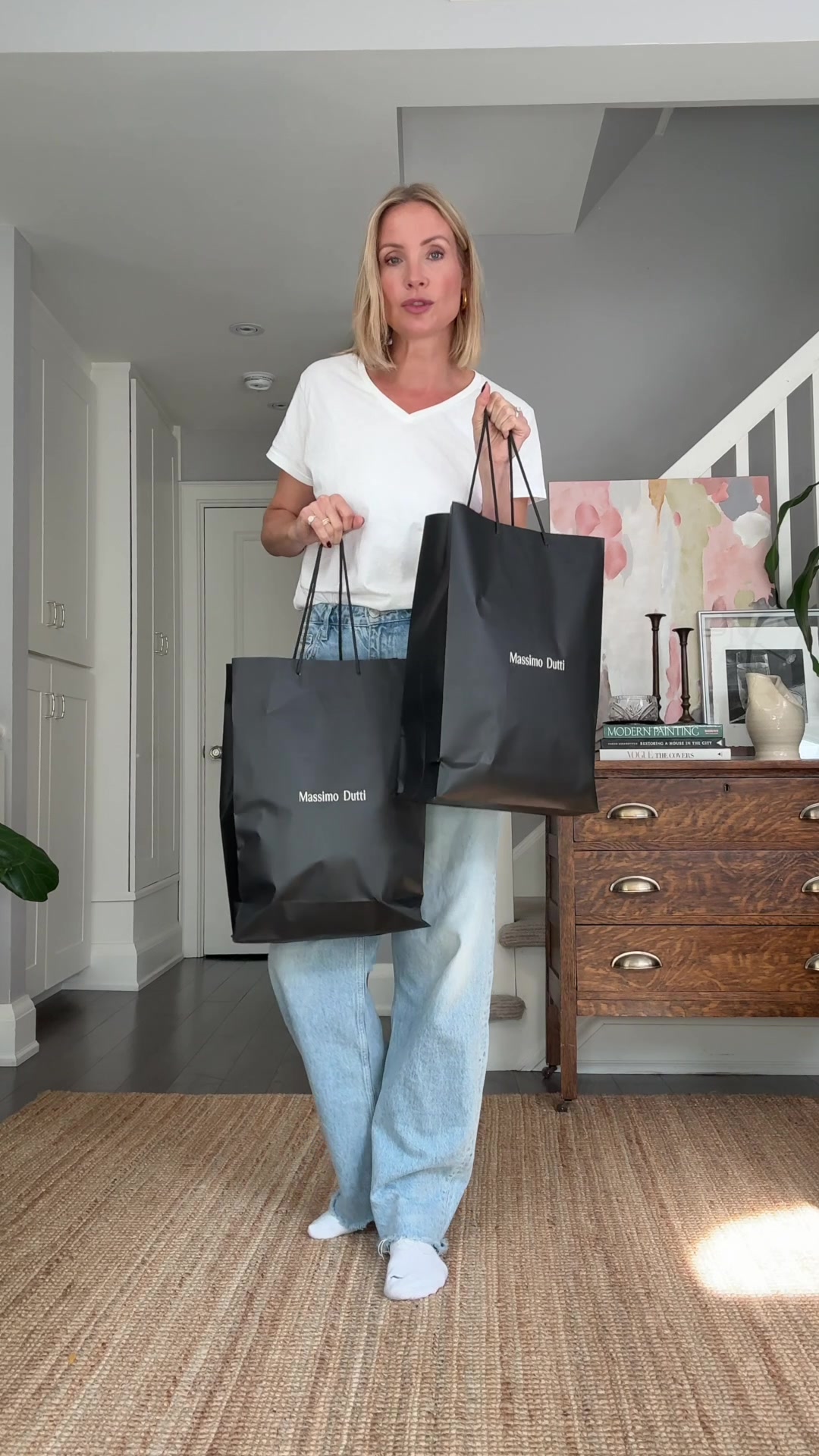 TikTok post by @livjudd for Massimo Dutti. Caption reads: all so elegant @Massimo Dutti — which is your....