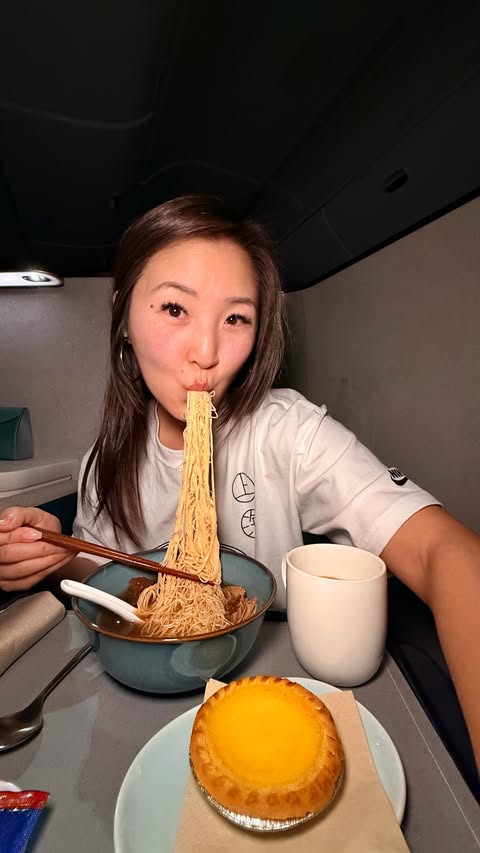 Instagram post by @eatingwithkirby for Cathay Pacific. Caption reads: Honestly 14 hours on this plane was not enough 🙈....