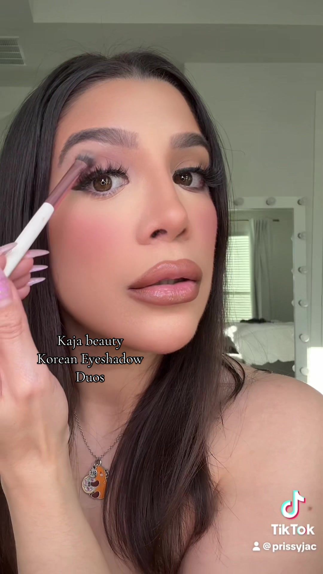 TikTok post by @prissyjac for Kaja Beauty. Caption reads: ✨ Kaja Beauty Korean Eyeshadow Bentos✨ Two for $28....